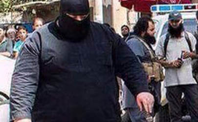 بولدوزر داعش در حال گردن زدن+ عکس